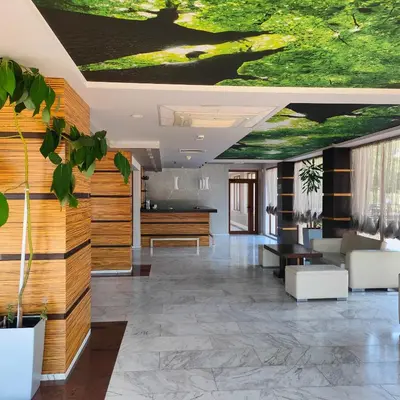 a lobby with a painting on the ceiling at Delta River Park in Sunny Beach