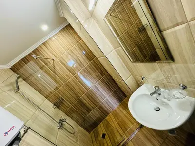 a bathroom with a sink and a mirror at HORIZON 34 'В' Apartment Sveti Vlas in Sveti Vlas