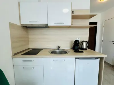 a kitchen with a sink and a counter top at HORIZON 27 'В' Studio Sveti Vlas in Sveti Vlas