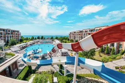 a water park at a resort with a slide at Premier Fort Apartment on Seafront in Sveti Vlas