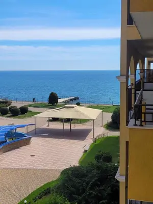 a view of the ocean from a building at ALMA DEL MAR - Miadia Grand Resort, Aheloy in Aheloy