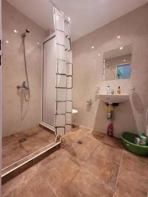 a bathroom with a shower and a sink at ALMA DEL MAR - Miadia Grand Resort, Aheloy in Aheloy