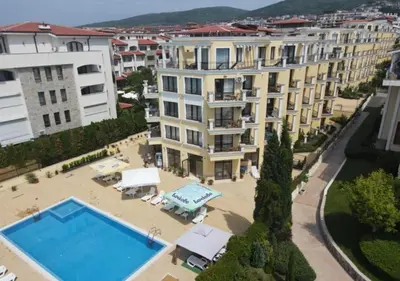 an aerial view of a building with a swimming pool at HORIZON 4 'А' Apartment Sveti Vlas in Sveti Vlas