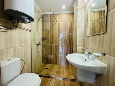 a bathroom with a toilet and a sink at HORIZON 2 'В' Apartment Sveti Vlas in Sveti Vlas