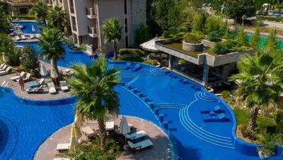 an aerial view of a pool at a resort at Coliber Apart Cascadas in Sunny Beach