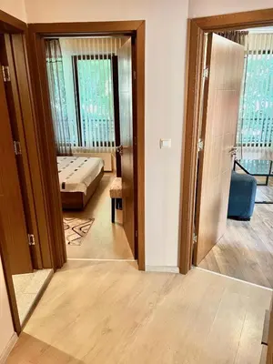 a room with a bedroom with a bed and a mirror at Varna Top Center 1 in Varna City