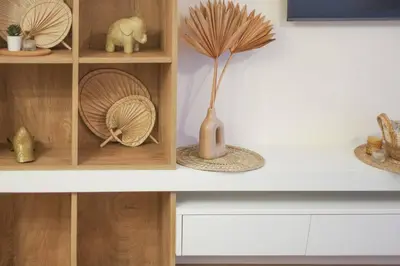 a shelf with a vase with a flower in it at Marina Varna Apartment-2BDR at South Bay Complex in Varna City