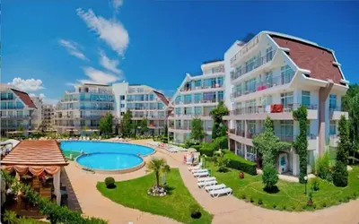 a large apartment building with a pool and a resort at SUN VILLAGE B 320 Apartment Sunny Beach in Sunny Beach