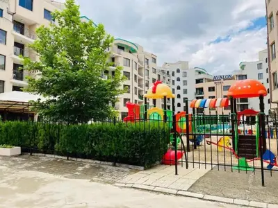 a playground in front of a apartment complex at Avalon studio,Sunny Beach in Sunny Beach