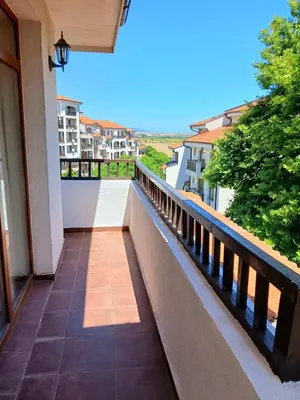 a balcony with a view of a building at Scenic, 2 Bedroom Apt with Views in Kableshkovo
