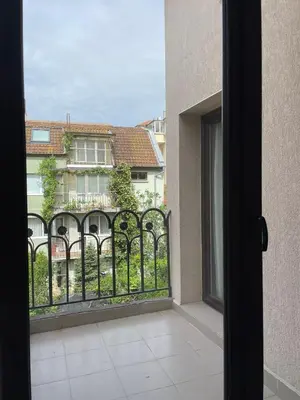 a balcony with a view of a building at Varna City Center Apartment in Varna City