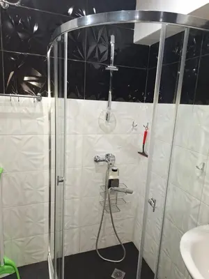 a bathroom with a shower and a sink at Green Paradise apartman 105 in Primorsko