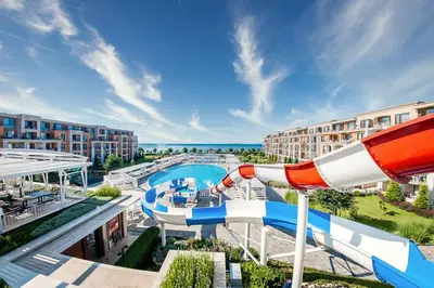 a water park at a resort with a water slide at Sea view Prestige Fort beach Apartment in Sveti Vlas