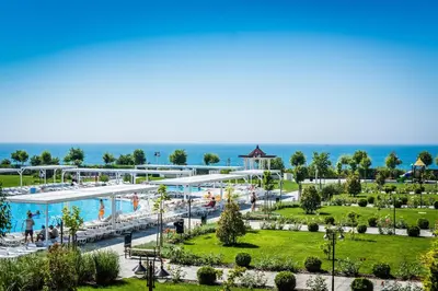 an aerial view of a resort with a swimming pool at Sea view Prestige Fort beach Apartment in Sveti Vlas