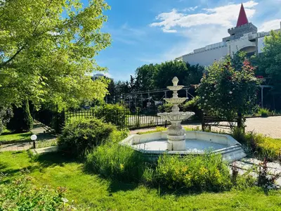 a fountain in the middle of a park at GRAND KAMELIA B 2,8 Large Studio Sunny Beach in Sunny Beach