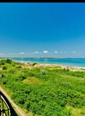 a view of a beach with the ocean in the background at Golden Hacienda in Sozopol