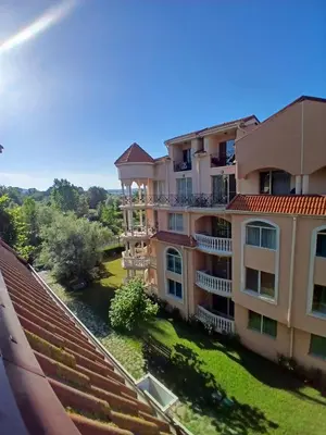 a view of a building from a balcony at Golden Hacienda in Sozopol