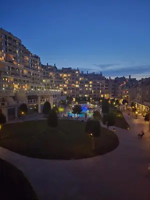 a view of a city at night with buildings at South Bay Apartment - Varna in Varna City