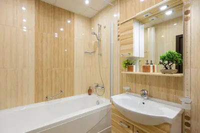 a bathroom with a tub and a sink and a bath tub at Infinity view 2 Shkorpilovci in Shkorpilovtsi