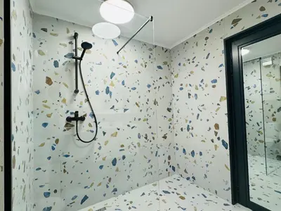a room with a rock wall with a climbing wall at PARADISO 'В' - 107 Panoramic Sea View Large STUDIO Nessebar in Nesebar