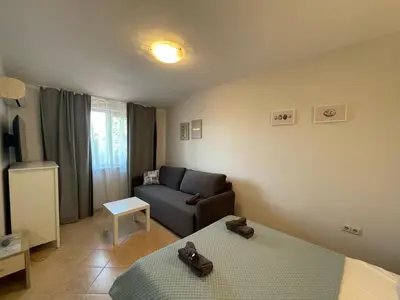 a small living room with a couch at Royal Sun - Premium Apartments in Sunny Beach