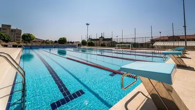 a large swimming pool on top of a building at Macon Residence - Premium Apartments in Sveti Vlas