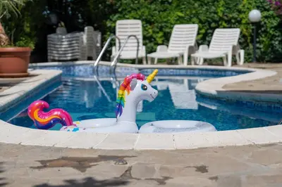 a toy unicorn in the middle of a swimming pool at Sea Vista Hotel in Sveti Vlas