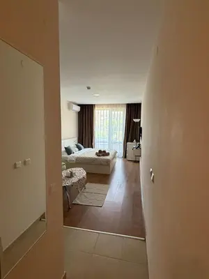 a view of a living room from a hallway at Apartment Premier Fort Beach hotel F1 420 in Sveti Vlas