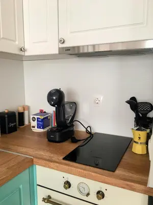 a kitchen counter with a black appliance on a counter top at Astell Superior Studio in Burgas City