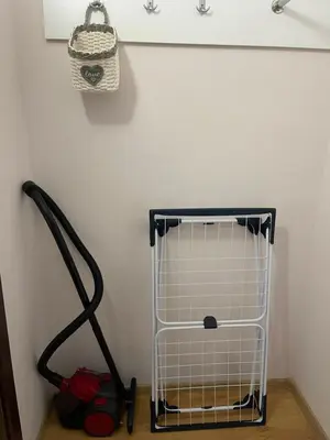 a bird cage in the corner of a room at Apartment in Long Beach in Shkorpilovtsi
