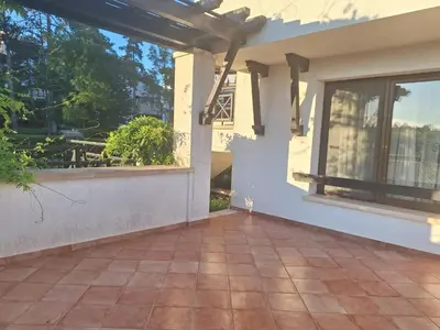 a patio outside of a house with a window at Bogdanov in Lozenets