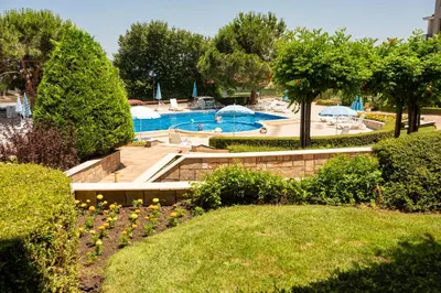 a view of a swimming pool in a resort at Apartment in Paradise View complex in Sozopol
