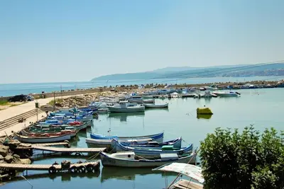 a bunch of boats are docked in a harbor at Nice 2 Bedrooms With Ocean View In Byala in Byala