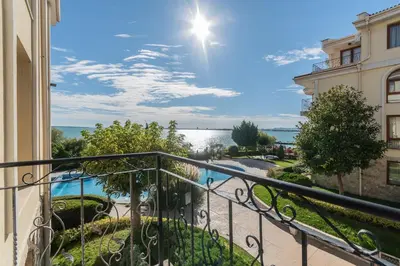 a balcony with a view of the water at Royal Bay Apartaments - Sveti Vlas in Sveti Vlas