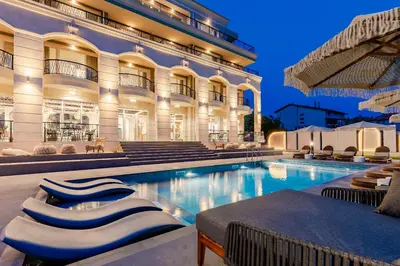 a building with a swimming pool in front of a building at Casa Deniso - The Home of Chill in Byala