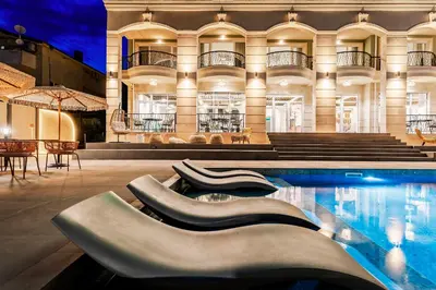a building with a swimming pool in front of a building at Casa Deniso - The Home of Chill in Byala