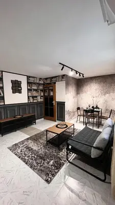 a living room with a couch and a table at Apartment Blue Summer II in Varna City