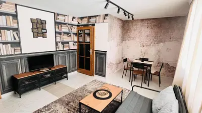 a living room with a couch and a table at Apartment Blue Summer II in Varna City