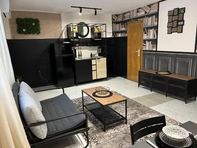 a living room with a couch and a table at Apartment Blue Summer II in Varna City