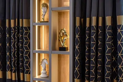 a room with a trophy on a shelf with curtains at Santa Maria Luxury Suits in Ravda
