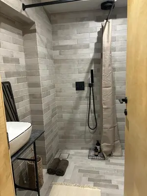 a bathroom with a shower and a sink at Casa Mint in Sozopol