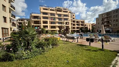 a park in a city with a large building at One bedroom Apartment in Sunny Beach