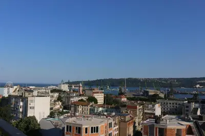 a view of a city with a river and buildings at Panoramic Penthouse Apartment in Varna City