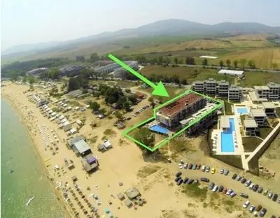 an aerial view of a parking lot next to the water at Студио 310 на първа линия in Chernomorets