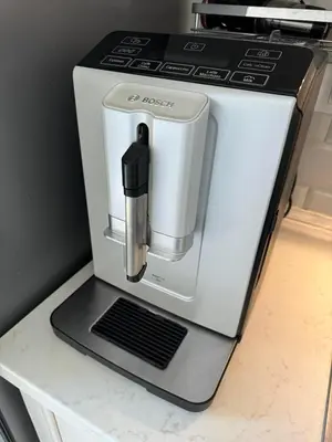 a coffee maker sitting on top of a counter at Апартамент Панорама Лазур in Burgas City