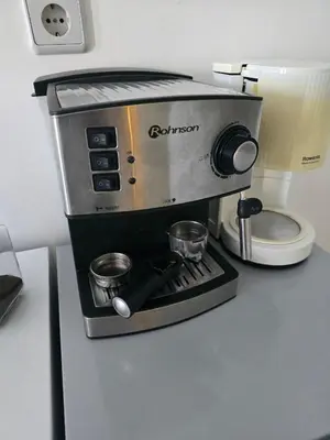 a coffee maker sitting on top of a counter at POMORIE Blue Bay in Pomorie
