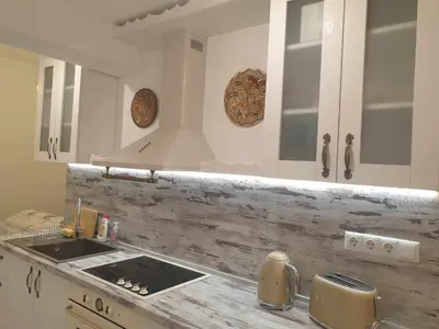 a kitchen with a sink and a counter top at BOHO CHIC STUDIO Free parking upon request in Varna City