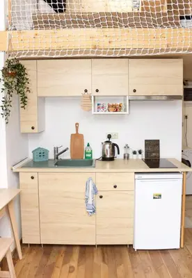 a kitchen with a sink and a counter top at Blue Sea Side Studio in Varna City