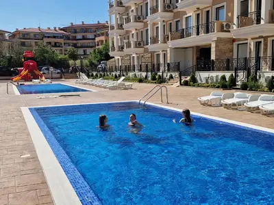 a group of people in a swimming pool at Polarstar 205A am Meer Sveti Vlas in Sveti Vlas