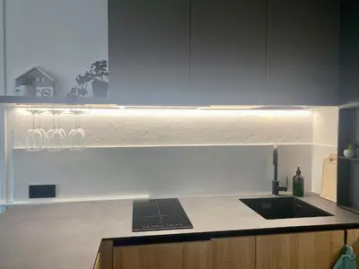 a kitchen with a laptop on top of a counter at KASHMIR Deluxe apartment with Parking in Burgas City